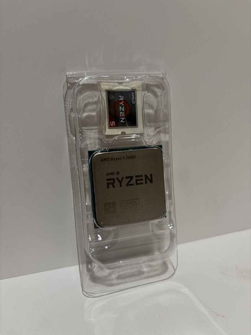 AMD Ryzen 5 3400G Processor + Stock Cooler | Vega 11 Graphics (Category: Computer Parts) located in Davao. Submitted by fbee5204e7fc0110b3e15efa2b36c1 (Listing ID 1463041319, Image 2). Description: 🔖 For Sale: AMD Ryzen 5 3400G Processor + Stock Cooler | Vega 11 Graphics 🏷️ Price: ₱4,500 📜 Take Note: • Personally used and in good working condition. • No known issues. • Includes the original stock cooler, stickers, and box. • Perfect for budget