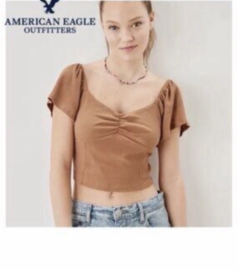 American Eagle Outfitters Lilac Ruched Crop Top (Category: Sleeveless) located in Calapan. Submitted by shakalak (Listing ID 1462932430, Image 2). Description: - Cute lilac crop top from American Eagle - Sweetheart neckline with ruched front detail -🇺🇸Bought -BEST FIT OXL-1XL - Feminine flutter sleeves - Comfortable ribbed fabric - Versatile: pairs perfectly with jeans or shorts - Ideal for casual outings or nights with friends.