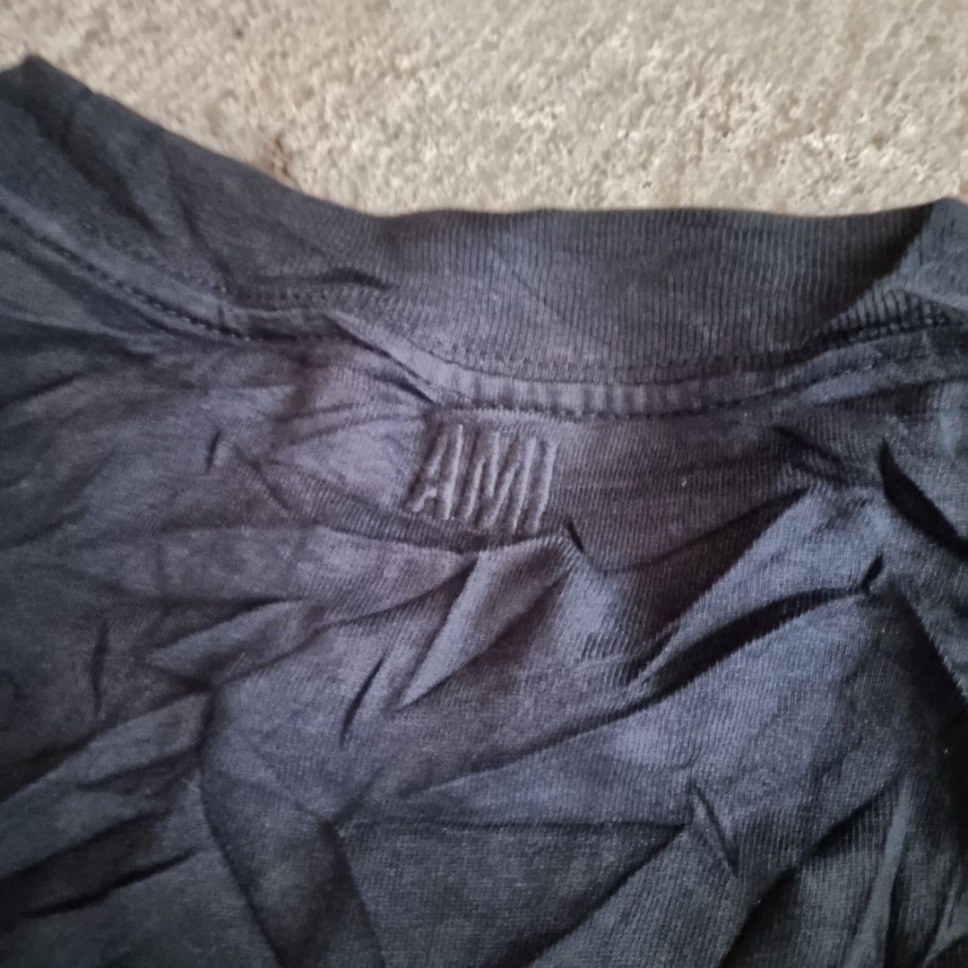 Ami shirt (Category: Activewear) located in New Washington. Submitted by kodak_ice (Listing ID 1463000888, Image 3). Description: dimes: 23x26 excellent Condition no issue only cut neck tag.