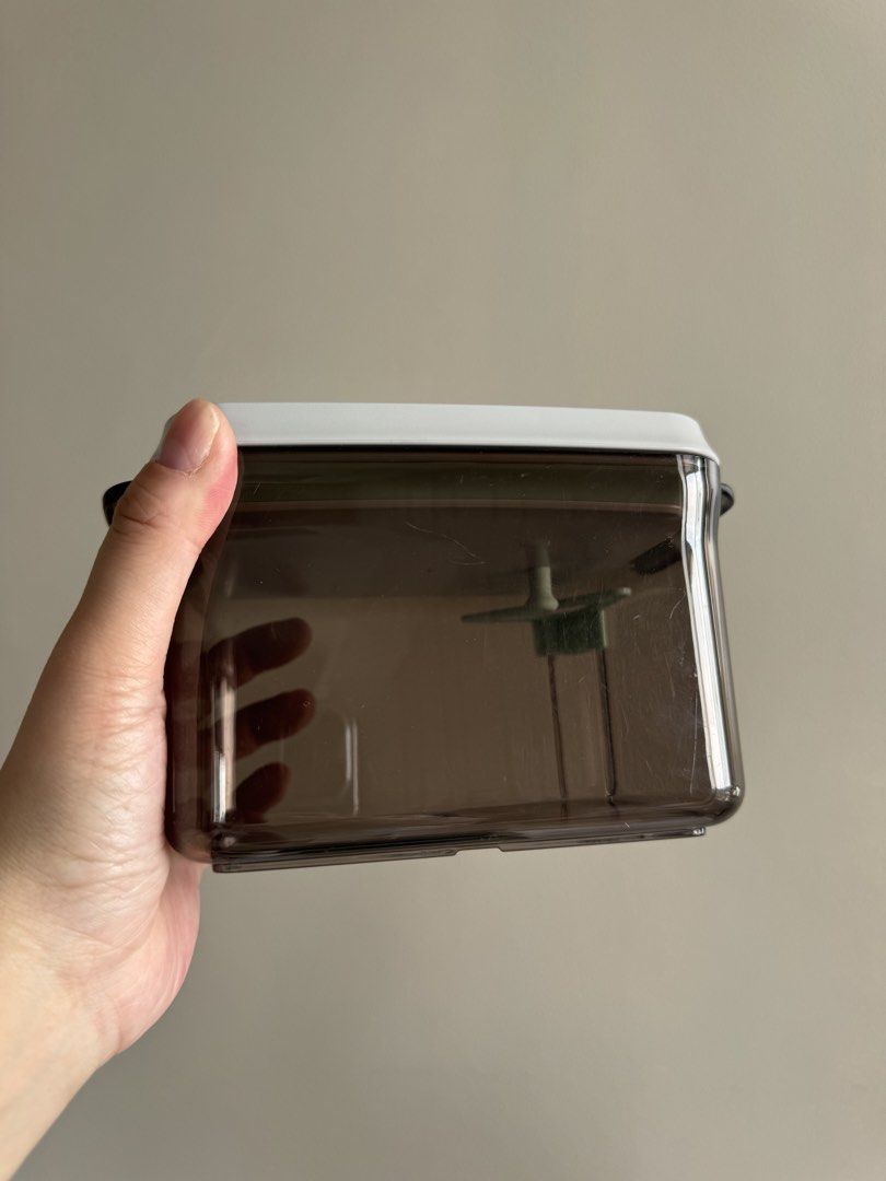 ANKOU powder container 1000ml (Category: Food Organization & Storage) located in Quezon City. Submitted by lrski (Listing ID 1462894950, Image 2). Description: With crack at the bottom but powder doesnt spill.