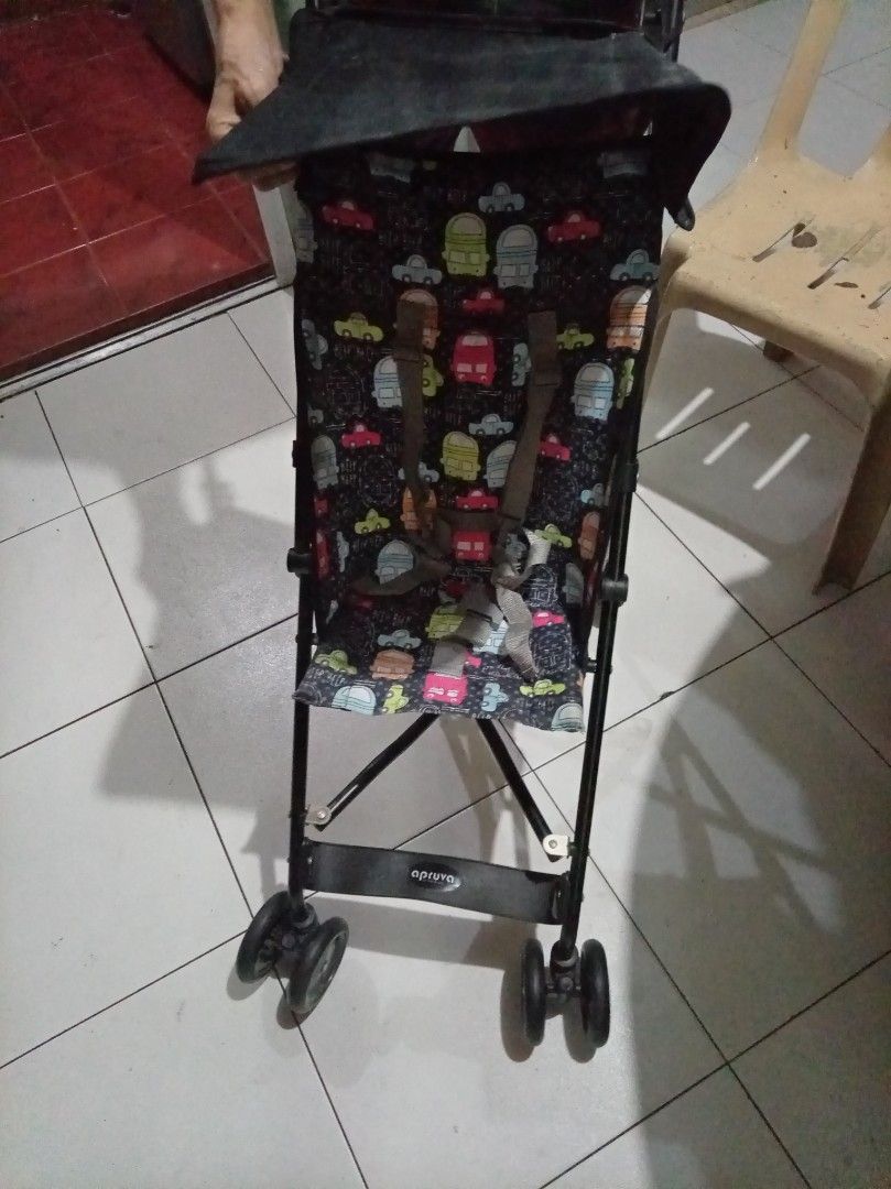 Apruva Lightweight Stroller with Car Print (Category: Strollers) located in Caloocan City. Submitted by maynaito (Listing ID 1463016846, Image 1). Description: - Apruva stroller with a fun car print fabric - Includes a canopy for sun protection - Equipped with a safety harness - Lightweight and easy to fold for convenience - Ideal for parents on the go Used only twice.