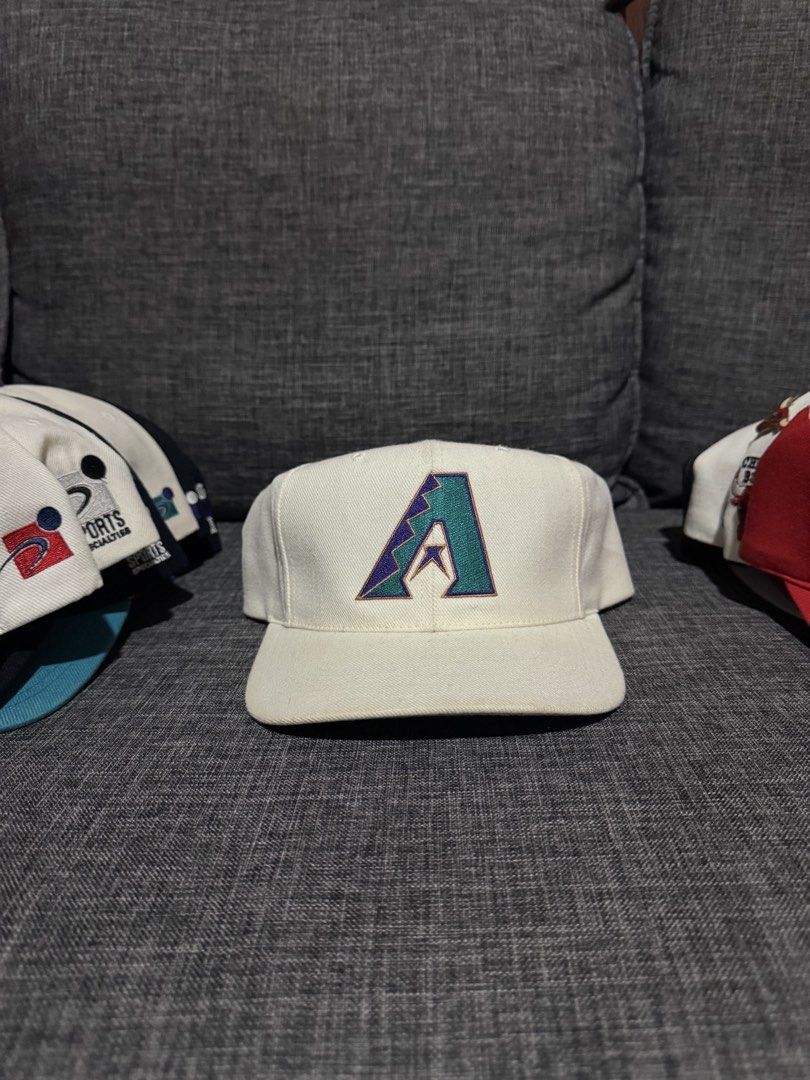 Arizona Diamondbacks Baseball Cap (Category: Caps & Hats) located in Solano. Submitted by Hustle.Everyday (Listing ID 1463038327, Image 1). Description: - White Arizona Diamondbacks baseball cap - Classic snapback style - Features the Diamondbacks logo on the front - Ready for a new home!.