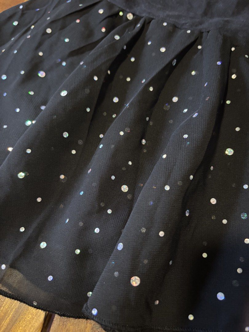 Arshiner Black Ballet Dress with Sparkles (Category: Babies & Kids Fashion) located in Manila. Submitted by wardrobeinmnl (Listing ID 1462932178, Image 3). Description: - Brand: Arshiner - Color: Black - Size: 130 - Style: Ballet dress - Features: Flutter sleeves, sparkly skirt with iridescent dots, sheer skirt overlay - Ideal for: Dance class, performances - Condition: Used, with some light marks on the bodice (please check photos for details).