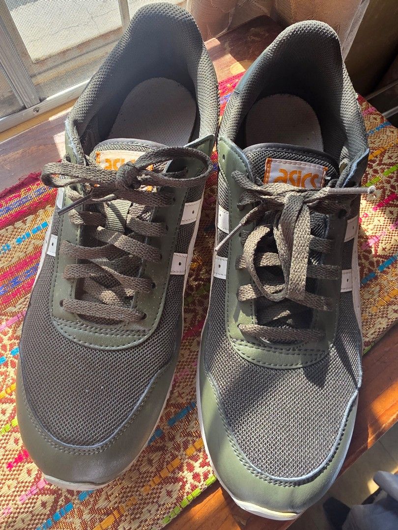 Asics Sneakers Green White (Category: Sneakers) located in Pasig City. Submitted by martymarcelo26 (Listing ID 1462946516, Image 3). Description: - Green Asics sneakers - Classic white stripes - Lace-up closure - Suitable for casual wear or light exercise - Minor scuffs on soles.
