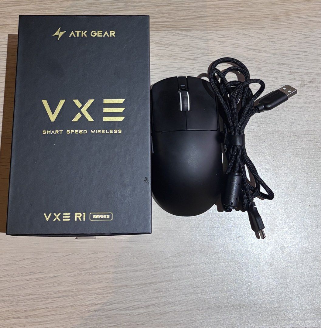 ATK Gear VXE R1 Smart Speed Wireless Mouse (Category: Mouse & Mousepads) located in Quezon City. Submitted by juanchodgz31145 (Listing ID 1463042207, Image 1). Description: - ATK Gear VXE R1 Smart Speed Wireless Mouse - Color: Black - Includes original box and charging cable - Ideal for gaming and everyday use.