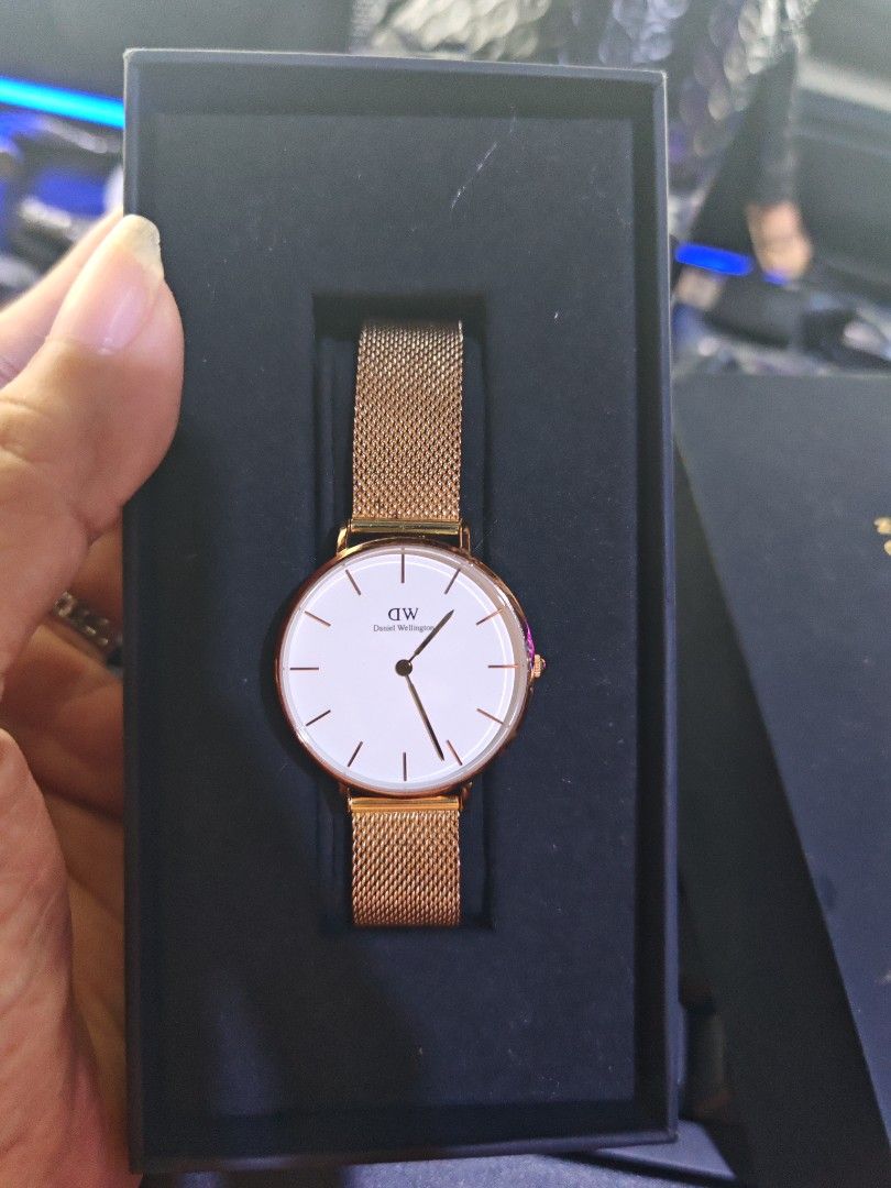 Auth Daniel Wellington Petite Melrose (Category: Women's Watches) located in Taguig. Submitted by mystuff4youph (Listing ID 1460742167, Image 1). Description: - Brand: Daniel Wellington - Model: Petite Melrose - Case Size: 28mm - Case Color: Gold - Dial Color: White - Strap: Gold Mesh - Includes: Original Box - Condition: Very good condition, minimal sign of wear still looks new. No issue, no defect. Perfectly working .
