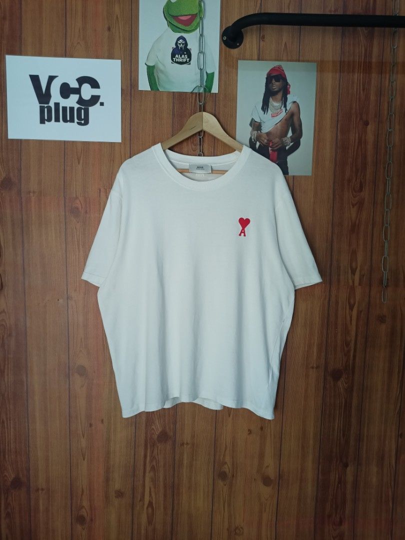 AUTHENTIC AMI Paris Red Chest Small Logo (FREE SHIPPING) (Category: Tshirts & Polo Shirts ) located in Abucay. Submitted by vcc.plug (Listing ID 1462956519, Image 1). Description: Authentic 💯 / FREE SHIPPING 24.5 x 28 Large-XL Boxy 🏷️ Still excellent - Needs rewash only 1 scratch see pics. (logo part) DM FOR MORE DETAILED PICS. 📍.