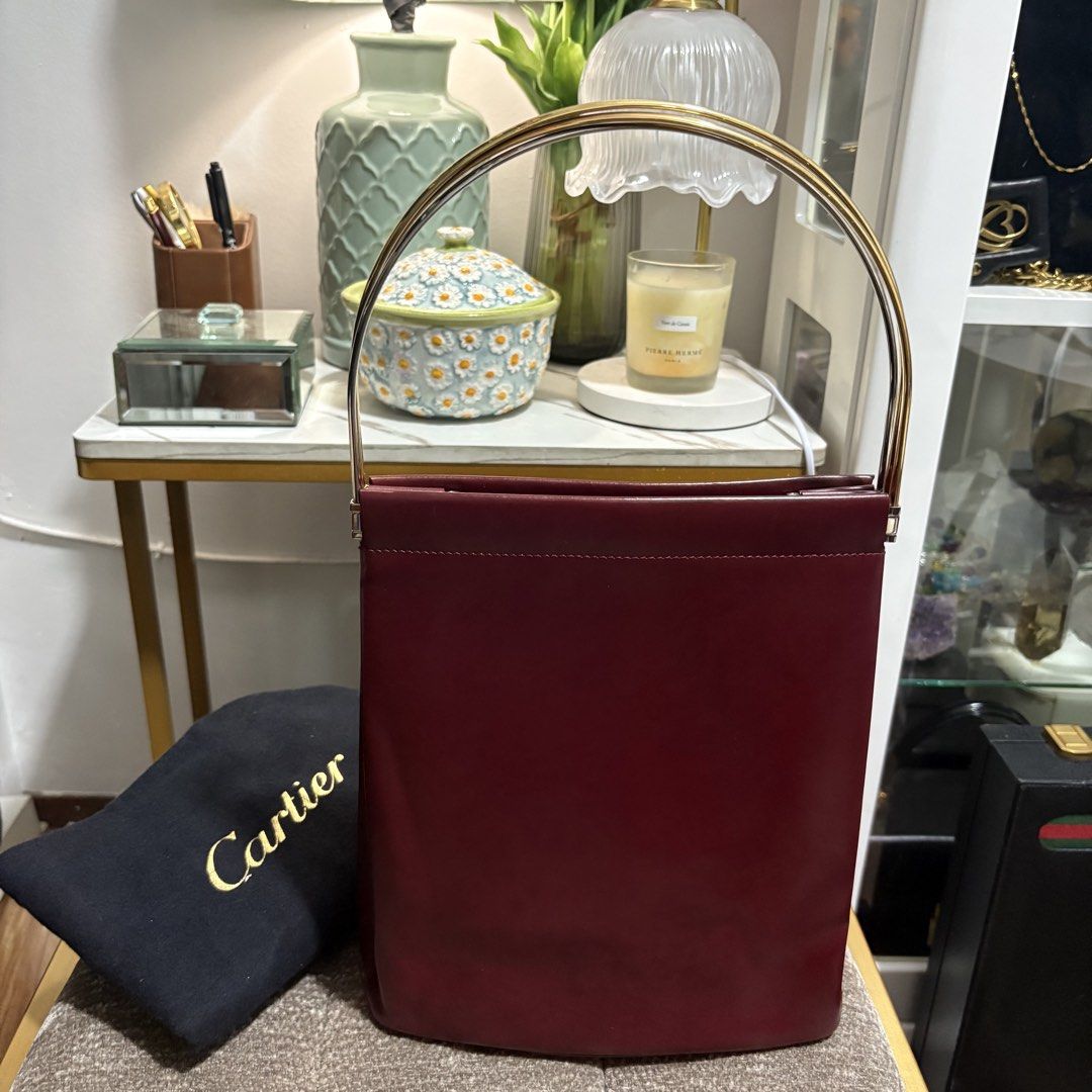 Authentic Cartier Trinity Burgundy Red Hand Bag (Category: Tote Bags) located in Binangonan. Submitted by makoleksyon (Listing ID 1462924319, Image 2). Description: Excellent condition Like new No flaws Crafted in High Quality Cartier Leather with Trinity Handles - given the meaning of Love, Fidelity and Friendship. Size: H-9.5 x W-8 x D-3.5 inches Bought in Japan 💯% Authentic Money back guarantee .