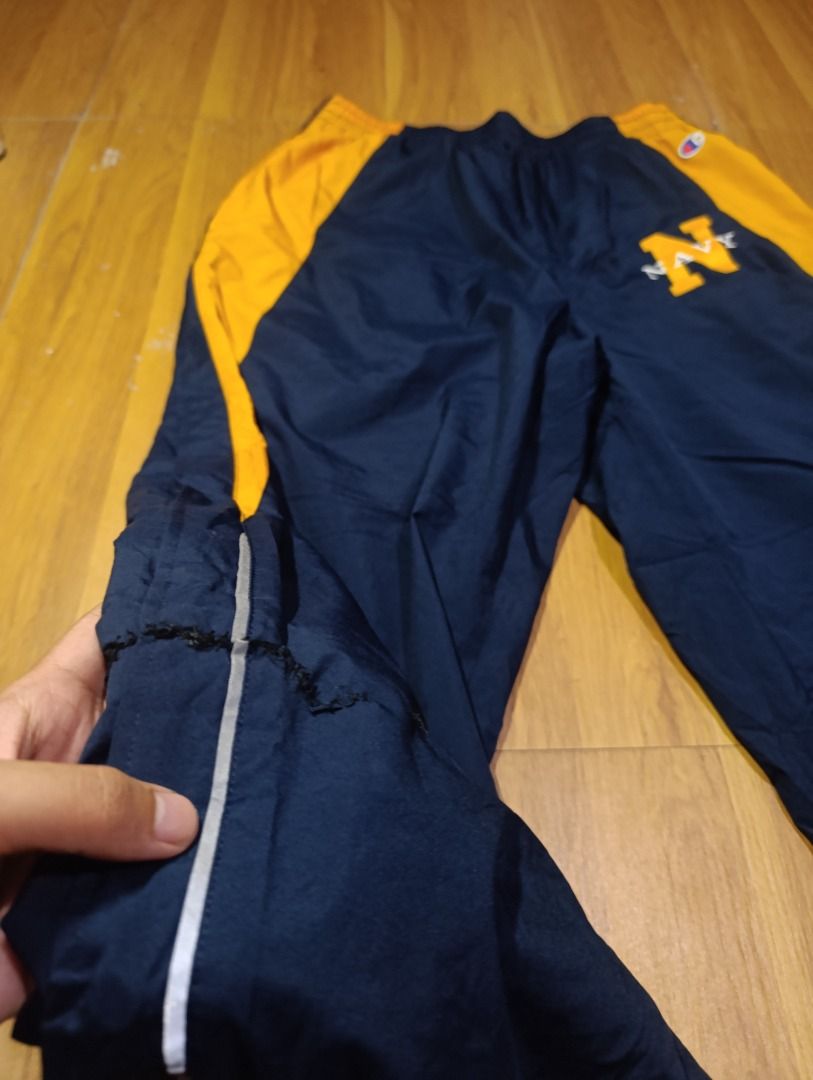 Authentic Champion U.S. Naval Academy Track Pants (Category: Joggers) located in Bulacan. Submitted by koritooo (Listing ID 1463052503, Image 2). Description: Authentic Champion U.S. Naval Academy Track Pants Good conditiom, stitch issue Complete tags/ Wash tags Size M Dimensions: 28-34 Width 38 Length 9 Hem Color rate: 10/10.
