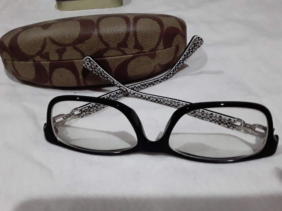 Authentic COACH Full Rim Rectangular Eyeglasses (Like New) (Category: Sunglasses & Eyewear) located in Marikina City. Submitted by rogaepupa (Listing ID 1462954137, Image 1). Description: Authentic COACH Eyewear / Eyeglasses Frame Condition: Like New (9.5/10). Used once or twice only. As good as new. No scratches, no fades, and no structural flaws. Completely clean. Features & Design: - Style: Optical full rim rectangular frame - Color: Sleek bla