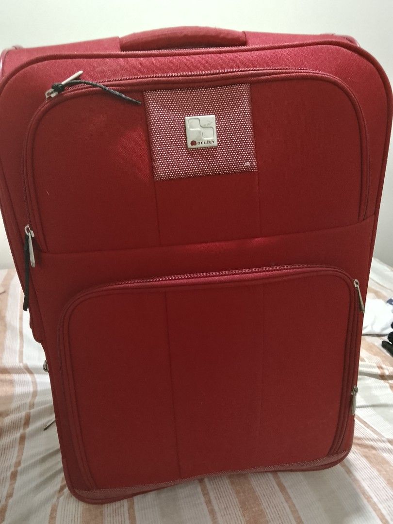 Authentic Delsey Red Luggage - RUSH (Category: Luggage) located in Pasig City. Submitted by exodusmomma (Listing ID 1463103276, Image 3). Description: - Red Delsey luggage - Front zippered pocket - Spacious main compartment - Shows some signs of wear, but still very functional - PRICE IS NEGOTIABLE .