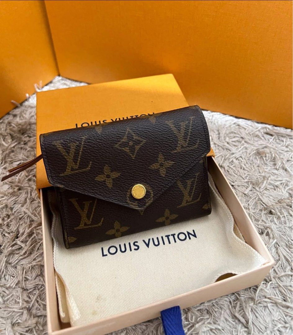 Authentic Louis Vuitton Victorine Wallet (Category: Luxury Bags & Wallets) located in Pasig City. Submitted by sheyfabph (Listing ID 1462910977, Image 2). Description: Authentic Louis Vuitton Victorine Wallet Microchipped Rank A condition: Minimal signs of use Comes with original box and dustbag -P18,500.