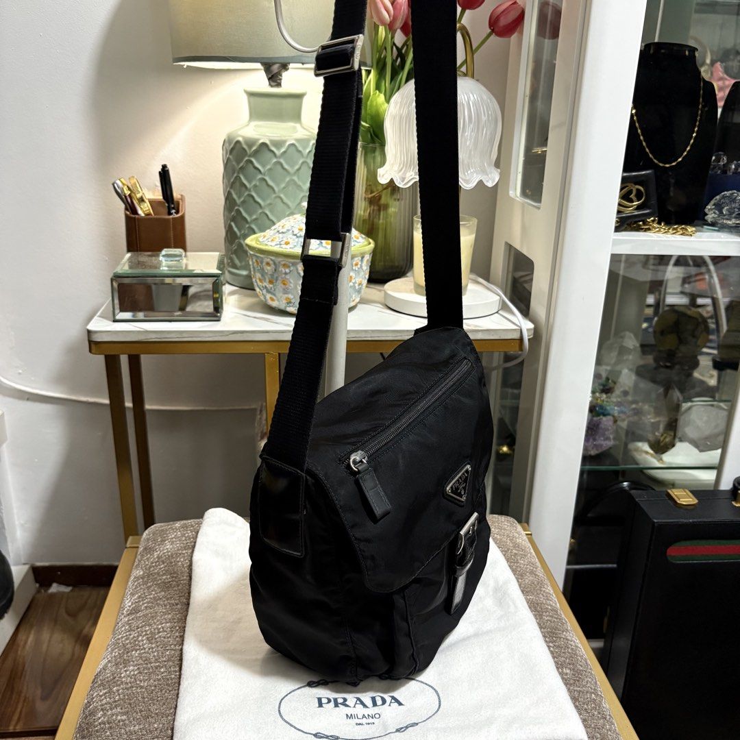 Authentic Prada Black tessuto Sling Bag (Category: Luxury Bags & Wallets) located in Binangonan. Submitted by makoleksyon (Listing ID 1462921347, Image 2). Description: Excellent condition Like new No flaws sa body at sa leather trim nya Issue lang sa metal plate nya sa loob tanggal yung black na kulay nya pero di naman halata pag ginamit nasa loob naman po. Size : H-9 x W-9 x D-4 inches With dust bag included Bought in Japan 💯% Authentic Money 