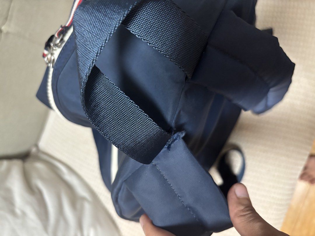 Authentic Tommy Hilfiger Navy Blue Backpack | Pre-loved (Category: Backpacks) located in Pasig City. Submitted by sheevecarmona (Listing ID 1463061279, Image 3). Description: Tommy Hilfiger Navy Blue Backpack 🎒 Authentic Tommy Hilfiger Navy blue nylon material Multiple compartments Adjustable padded shoulder straps Spacious main compartment Condition: Good / Pre-loved Used but still in good overall condition. All zippers are working properly. Mi