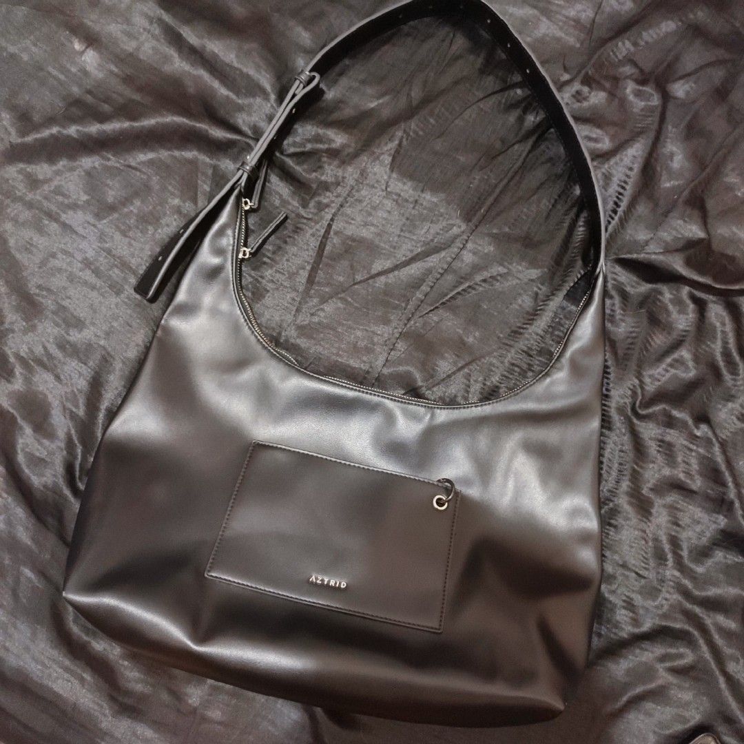 AZTRID large crossbody hobo bag (Category: Shoulder Bags) located in Santa Rosa. Submitted by acepresso (Listing ID 1462906245, Image 2). Description: •Front and inner slip pockets, an inner zippered pocket & a spacious main compartment •Adjustable strap that can be worn as a shoulder bag & crossbody bag •Used once, swipe for actual photos •RFS: Too many bags •Non-negotiable, last price na.