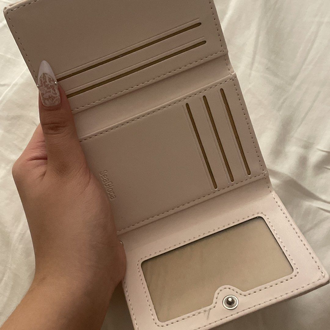baby pink tri-fold wallet (Category: Wallets & Card holders) located in Pasay City. Submitted by fromyaning (Listing ID 1463051471, Image 2). Description: - unused! - mop:gcash - mod: jnt.