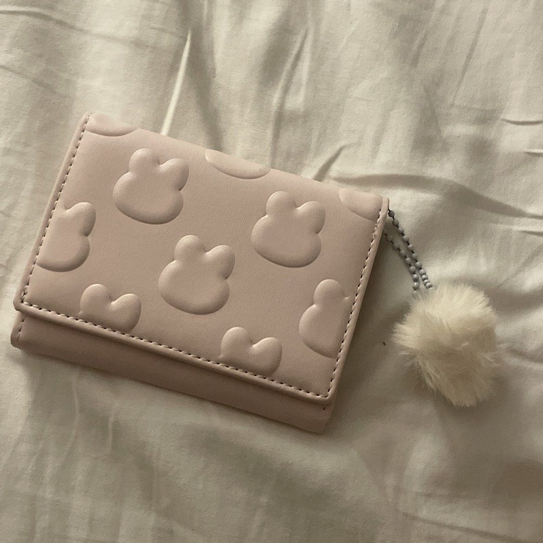 baby pink tri-fold wallet (Category: Wallets & Card holders) located in Pasay City. Submitted by fromyaning (Listing ID 1463051471, Image 1). Description: - unused! - mop:gcash - mod: jnt.