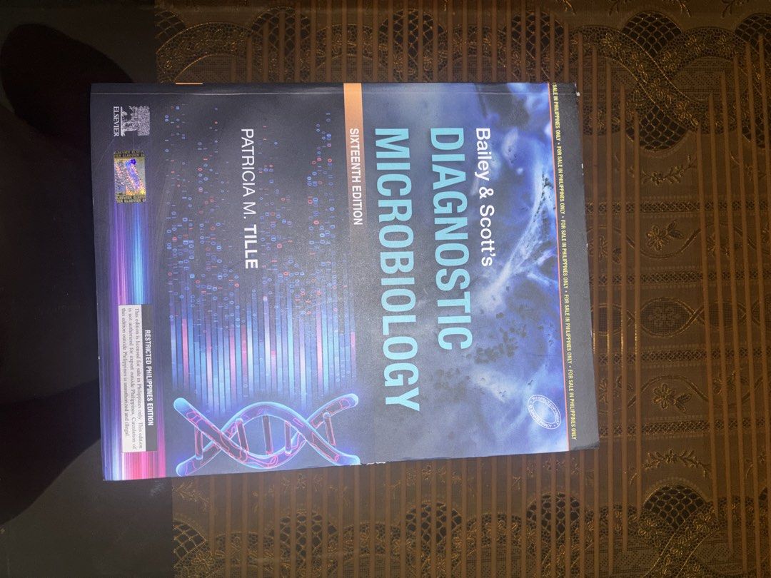 Bailey & Scott's Diagnostic Microbiology 16th Edition Textbook (Category: Textbooks) located in Quezon City. Submitted by jayeeee_11 (Listing ID 1462998073, Image 1). Description: - Bailey & Scott's Diagnostic Microbiology, Sixteenth Edition - Written by Patricia M. Tille - Restricted Philippines Edition - Ideal for microbiology students - Please check photos for detailed condition.