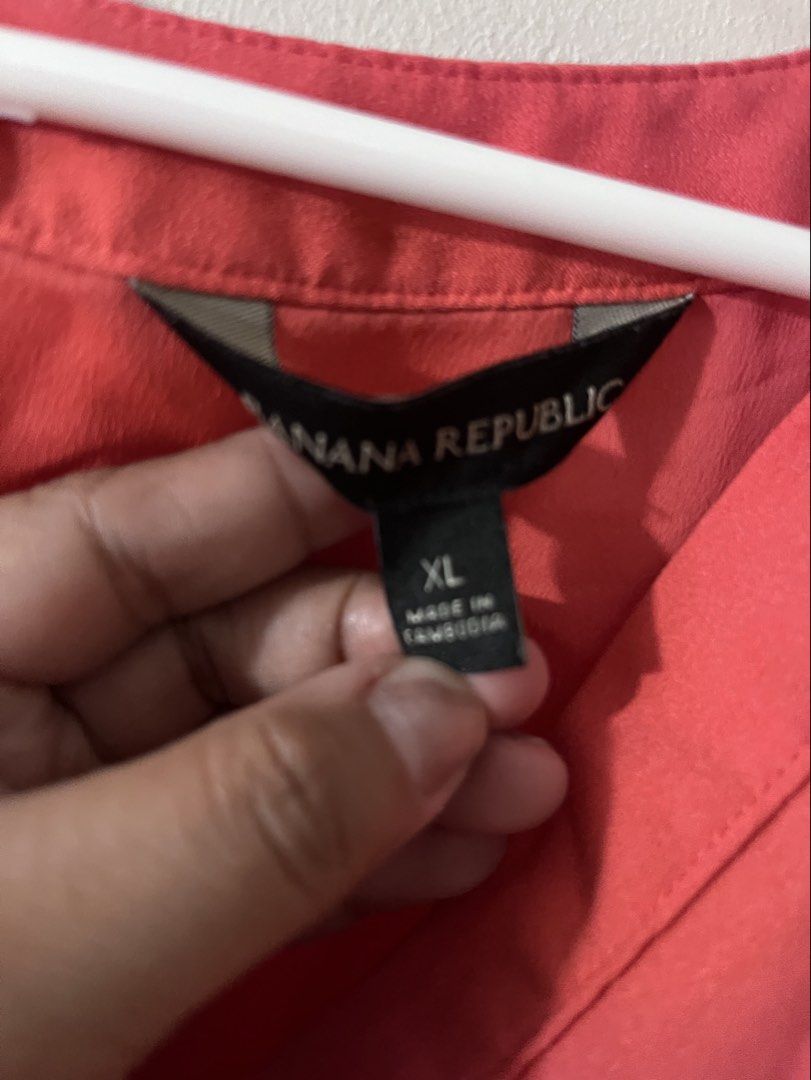 Banana Republic Blouse (Category: Others Tops) located in Mandaluyong City. Submitted by skylistings_c (Listing ID 1462925326, Image 3). Description: XL color Orange Silk.