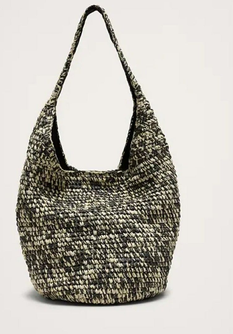 Banana Republic Raffia Tote Bag (Category: Luxury Bags & Wallets) located in Taguig. Submitted by nanzmango (Listing ID 1462980009, Image 2). Description: - Brand new Banana Republic raffia tote bag from Canada - One size only - Stylish black and natural woven pattern - Secure magnetic snap closure - Convenient inner zip pocket - Fully lined interior - Beige color-1 pc and black n white -1 pc available. on hand in Taguig .