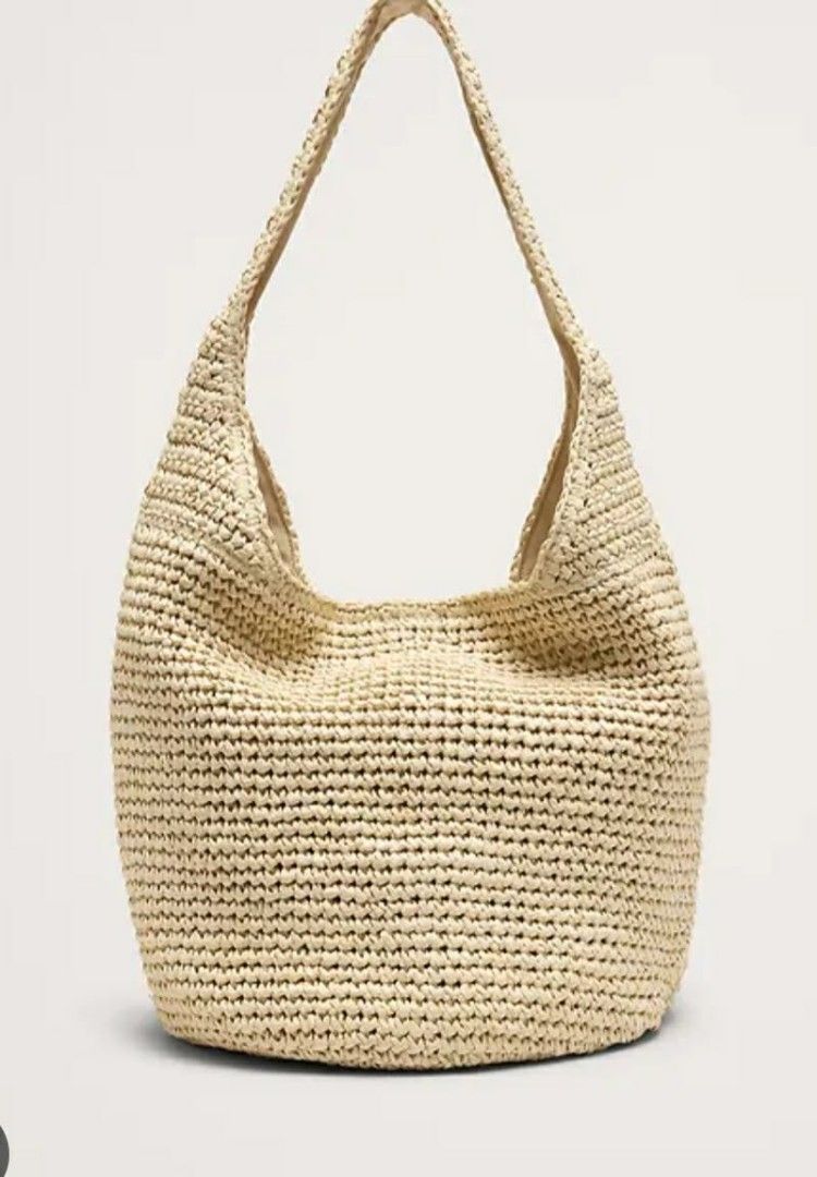 Banana Republic Raffia Tote Bag (Category: Luxury Bags & Wallets) located in Taguig. Submitted by nanzmango (Listing ID 1462980009, Image 3). Description: - Brand new Banana Republic raffia tote bag from Canada - One size only - Stylish black and natural woven pattern - Secure magnetic snap closure - Convenient inner zip pocket - Fully lined interior - Beige color-1 pc and black n white -1 pc available. on hand in Taguig .