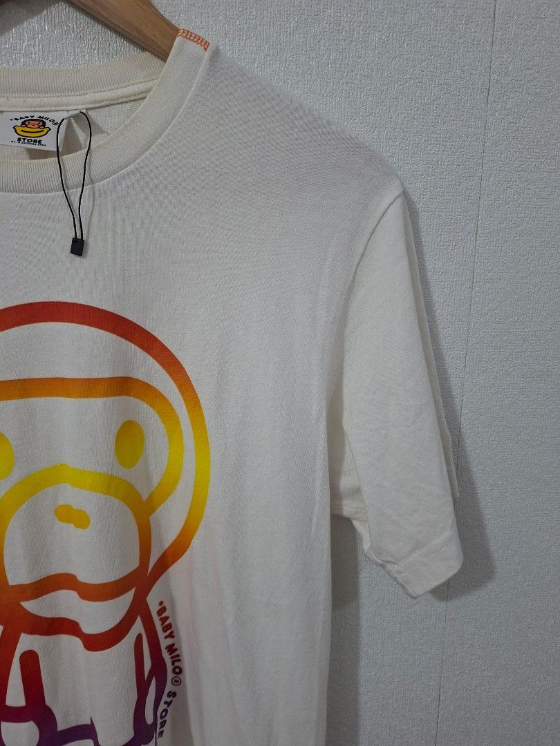 Bape baby milo store shirts (Category: Tshirts & Polo Shirts ) located in Cavite. Submitted by labbudds20 (Listing ID 1463069854, Image 2). Description: bape baby milo store shirts size medium armpit to armpit 19.5 inches length 28 inches need wash excellent condition see pictures for details.