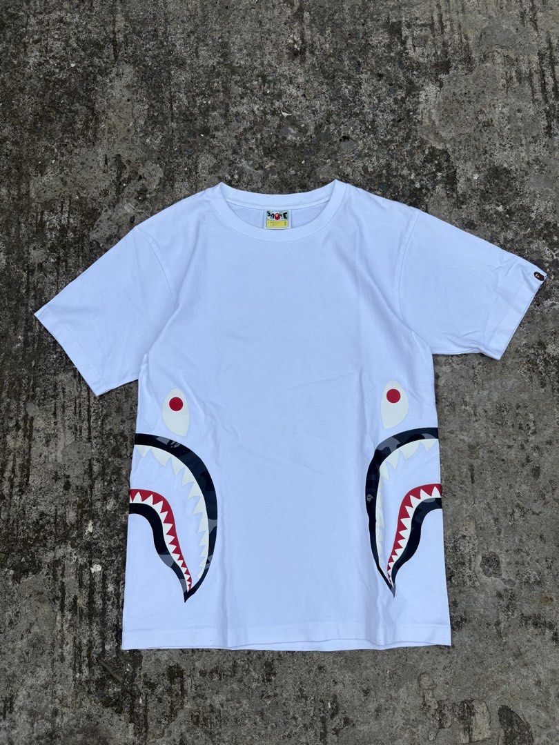 BAPE side Shark Tee White (Category: Tshirts & Polo Shirts ) located in Davao. Submitted by brandedthrift.134 (Listing ID 1462981625, Image 1). Description: bape side shark tee Length:26.5” Width:18” 10/10 print condition excellent .