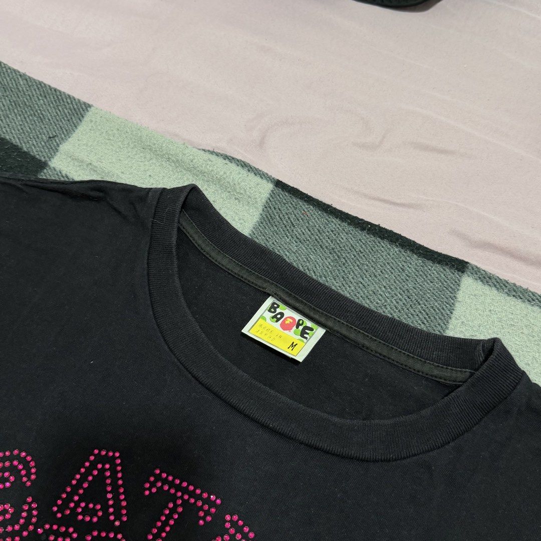 BAPE Swarovski Collection (Category: Shirts) located in Mandaluyong City. Submitted by pl.closet (Listing ID 1462976171, Image 3). Description: BAPE swarovski collection Size M on tag All details posted - no additional tags Bought from creators closet for 1.5k Color rate: 8.5/10 AS IS - what you see is what you get Loc: Mandaluyong City .