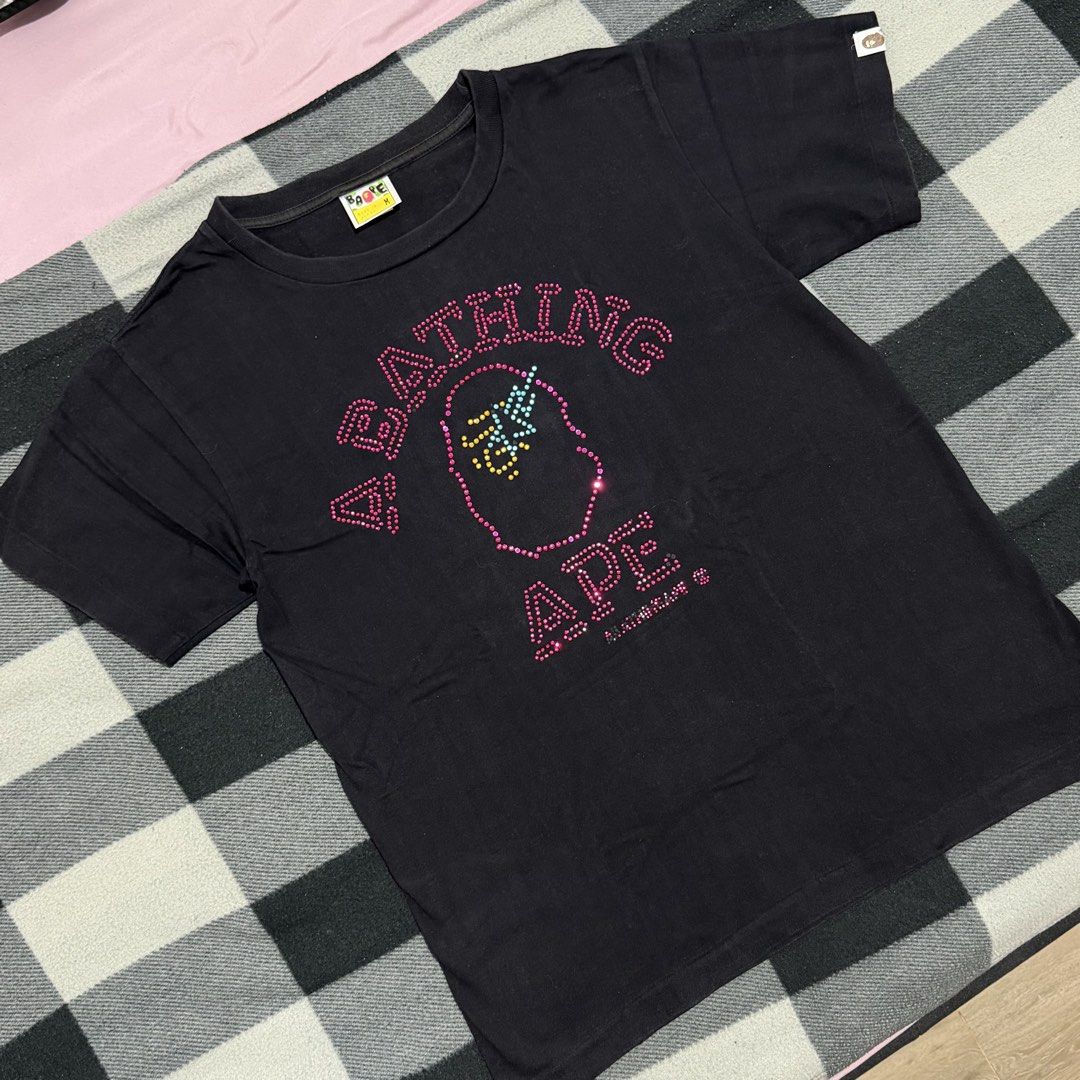 BAPE Swarovski Collection (Category: Shirts) located in Mandaluyong City. Submitted by pl.closet (Listing ID 1462976171, Image 1). Description: BAPE swarovski collection Size M on tag All details posted - no additional tags Bought from creators closet for 1.5k Color rate: 8.5/10 AS IS - what you see is what you get Loc: Mandaluyong City .
