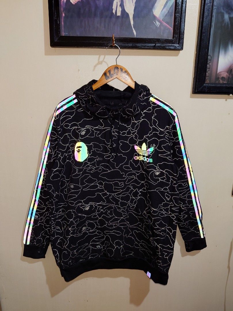 Bape X Adidas (Category: Hoodies) located in Taytay. Submitted by GRIND720_II (Listing ID 1463023877, Image 2). Description: Bape X Adidas refletorize hoodie small over size Best fit to LARGE 23.5 X 29 Excellent condition 4999 issue fade yung tag sa hem check last picture.