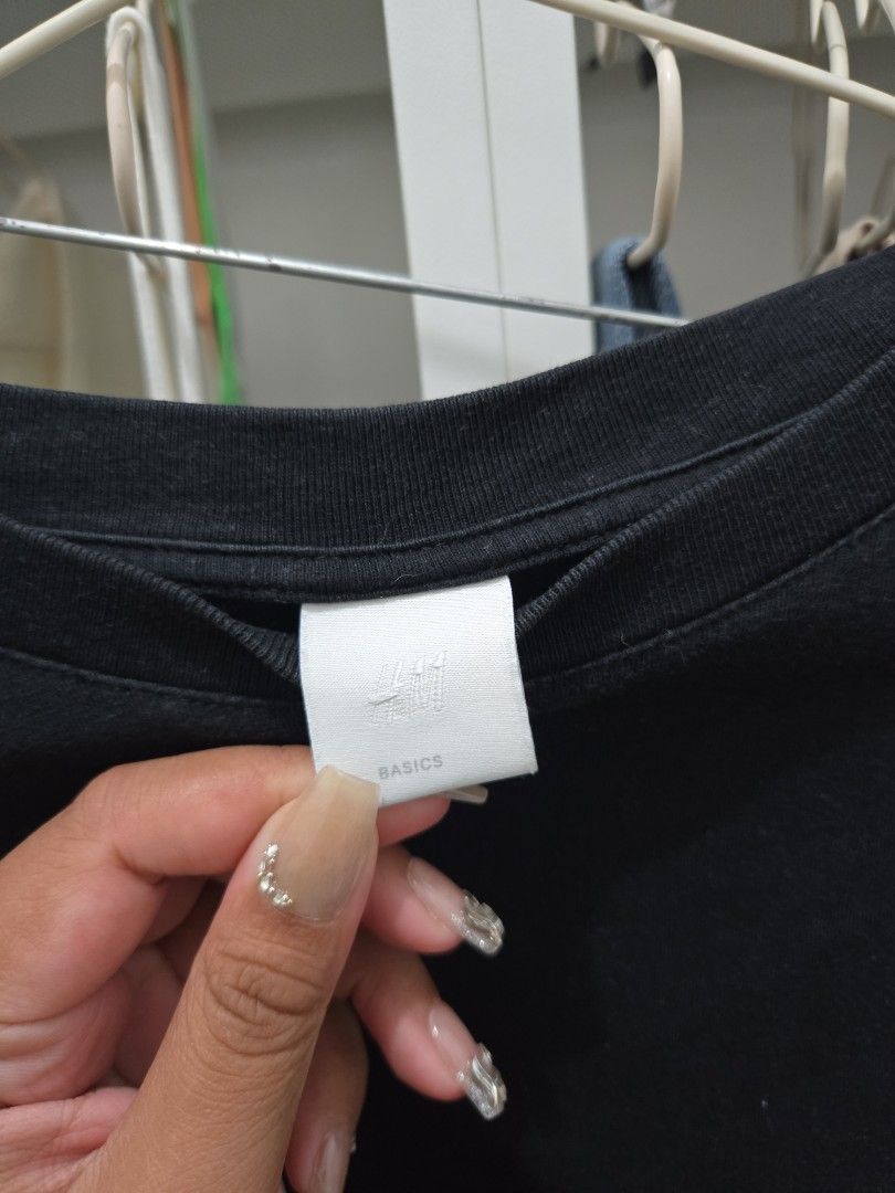 Basic Black Shirt - H&M (Category: Shirts) located in Agoncillo. Submitted by ariannacvii (Listing ID 1462994274, Image 2). Description: 👚 Pre-Loved Basic Black Shirt — ₱150 I’m currently decluttering my wardrobe and letting go of some of my pre-loved clothes! 🤍 • Size: M • Brand: H&M • Condition: Like New • Price: ₱150 ✨ Perfect for casual, everyday outfits and easy to style! 📌 IMPORTANT NOTE: Some of my clothes have been stored and unused fo