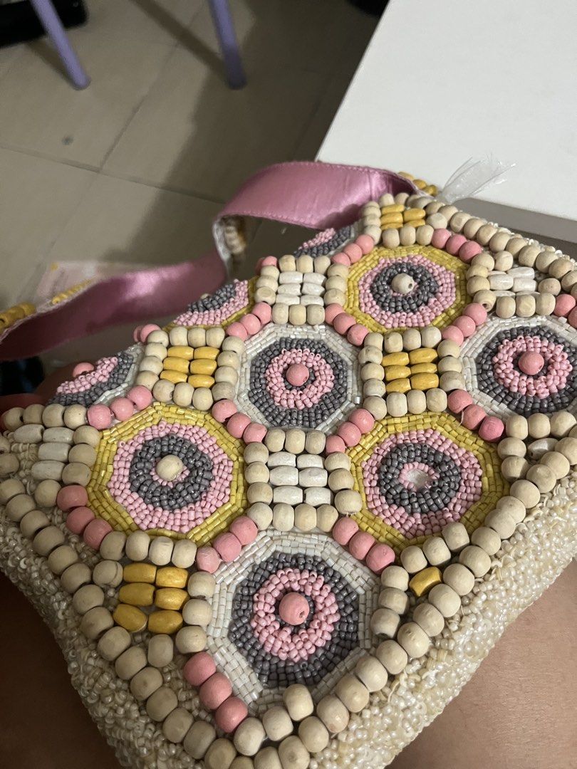 Bead bag (Category: Shoulder Bags) located in Paranaque City. Submitted by tuna0000 (Listing ID 1463012746, Image 2). Description: Made in INDIA Brand new but napigtas yung tali for the bead sa strap side. Best for those na marunong mag DIY Bought last 2022 in marshalls. Tas never used.