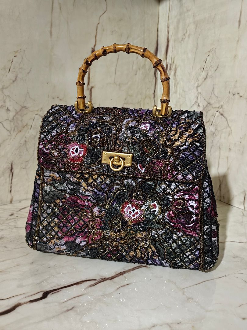 Beaded Tapestry Handbag with Bamboo Handle (Category: Tote Bags) located in Tarlac. Submitted by jeremiah.curator.2026 (Listing ID 1462891158, Image 1). Description: - Unique beaded tapestry handbag - Colorful floral and abstract pattern - Natural bamboo top handle - Secure gold-tone clasp closure - Perfect statement accessory - Dimensions: Approx. 11" wide x 8" tall.