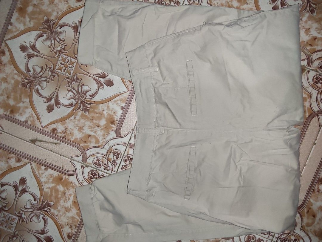 Bershka Beige Cropped Pants (Category: Other Bottoms) located in Manila. Submitted by chocobutternut_ (Listing ID 1463071488, Image 3). Description: - Beige cropped pants from Bershka - Button and zip closure - Two front pockets and two back pockets - Made in Turkey - Size: EUR 36 / USA 04 / MEX 26 - Ideal for casual wear - with belt note: with stains (not sure if washable).
