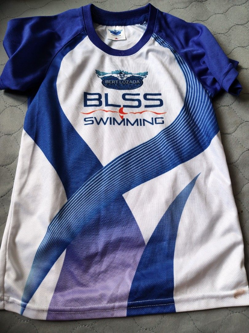 Bert Lozada BLSS Swimming T-shirt (Category: Babies & Kids Fashion) located in Mandaluyong City. Submitted by locolady (Listing ID 1463077720, Image 1). Description: - Bert Lozada BLSS Swimming T-shirt - Blue and white design - Features "BLSS SWIMMING" text - price for both shirts.
