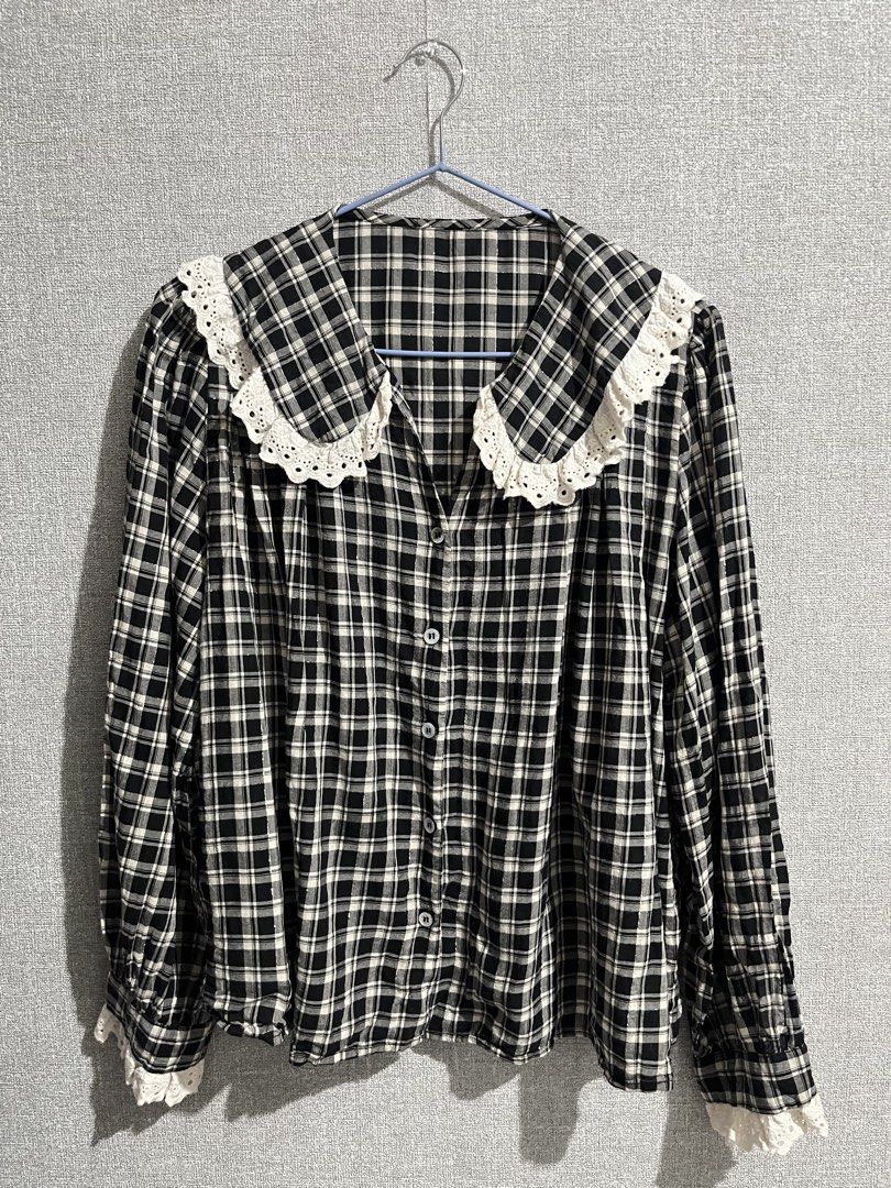 Black and White Plaid Blouse with Laced Collar (Category: Blouses) located in Marikina City. Submitted by femmeshoppemnl (Listing ID 1462923418, Image 2). Description: Black and White Plaid Blouse with Laced Collar and Cuffs Size: XL-2XL Condition: Used. Issue: No issue. Brand: No brand. Ukay sourced. Washed - ready to wear..