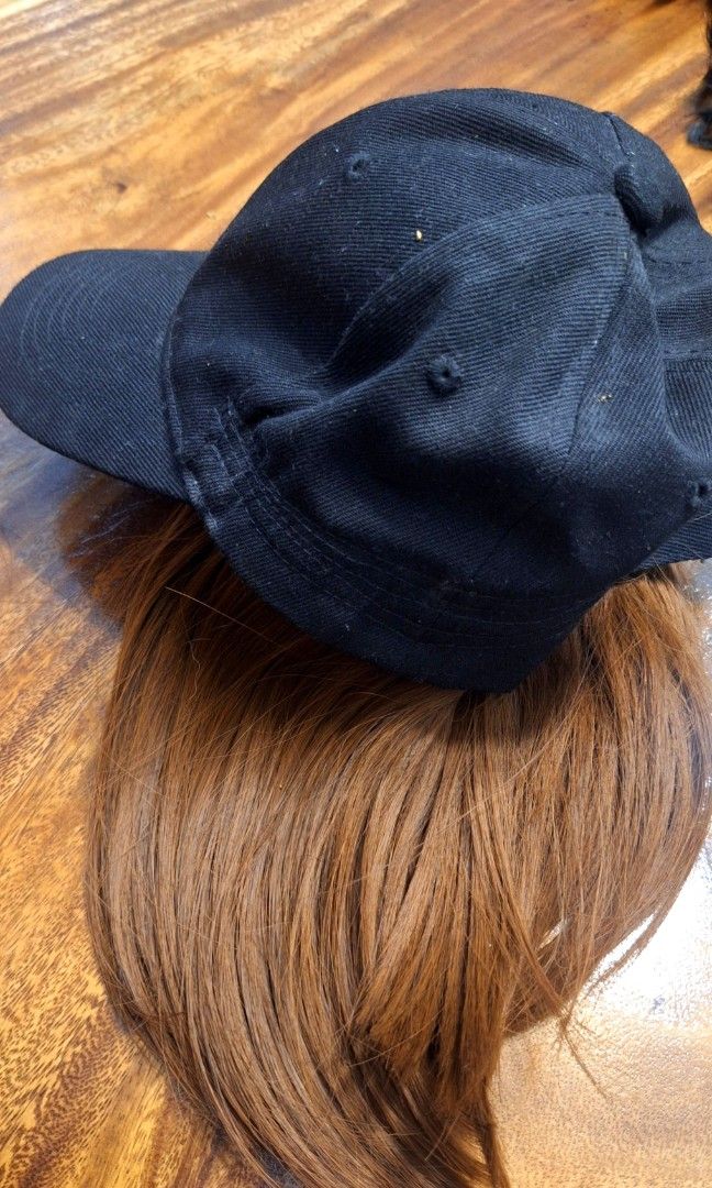 Black Baseball Cap with Brown Hair Extension (Category: Hair Accessories) located in Quezon City. Submitted by tinylittlecorner (Listing ID 1462923042, Image 2). Description: Fun baseball cap with attached brown hair! Adjustable cap, synthetic hair. Great for costumes or everyday fun. 2 pcs available.