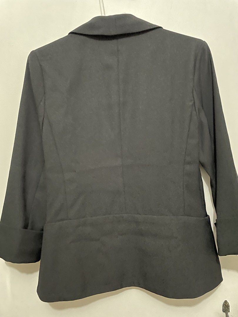 Black Blazer with Cuffed Sleeves (Category: Coats, Jackets and Outerwear) located in Quezon City. Submitted by aikkosan (Listing ID 1462982082, Image 2). Description: - Classic black blazer - Draped front design - Cuffed sleeves - Sharp and professional look - Ideal for work or dressing up outfits - Easy to style and layer.