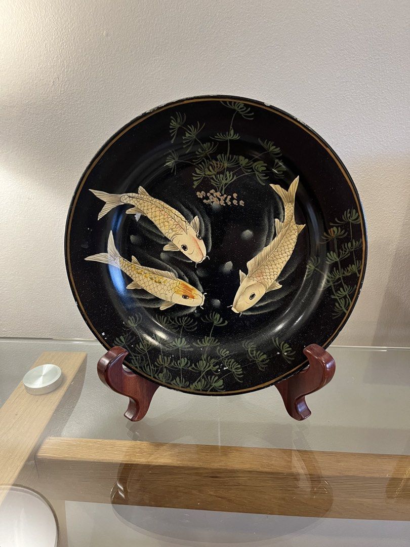 Black Decorative Plate with Koi Fish Design (Category: Other Home Decor) located in Quezon. Submitted by vintage66 (Listing ID 1462985799, Image 1). Description: - Stunning black plate featuring three vibrant koi fish. - Detailed aquatic plant design adds a touch of nature. - Comes with a complimentary wooden display stand. - Ideal for enhancing your home decor. - Makes a unique and thoughtful gift..