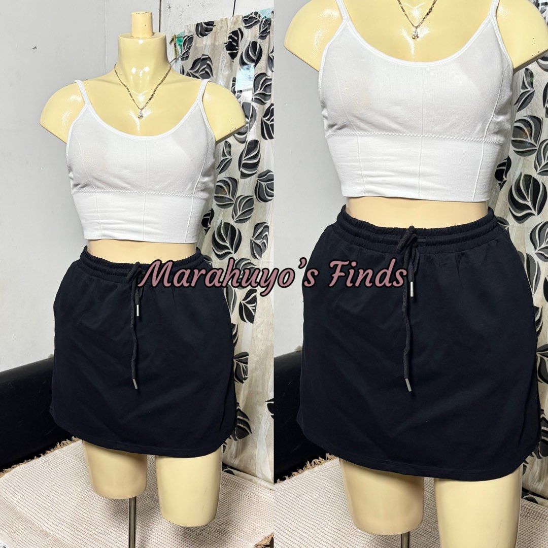 Black Drawstring Skirt with Inner Short Size M-L (Category: Skirts) located in Mabalacat. Submitted by marahuyos.finds (Listing ID 1462931142, Image 2). Description: - Black skirt with elastic drawstring waist - Includes inner shorts for comfort and coverage - Fits waist sizes 28-34 inches - Size: M-L - Ideal for casual wear or sports activities.