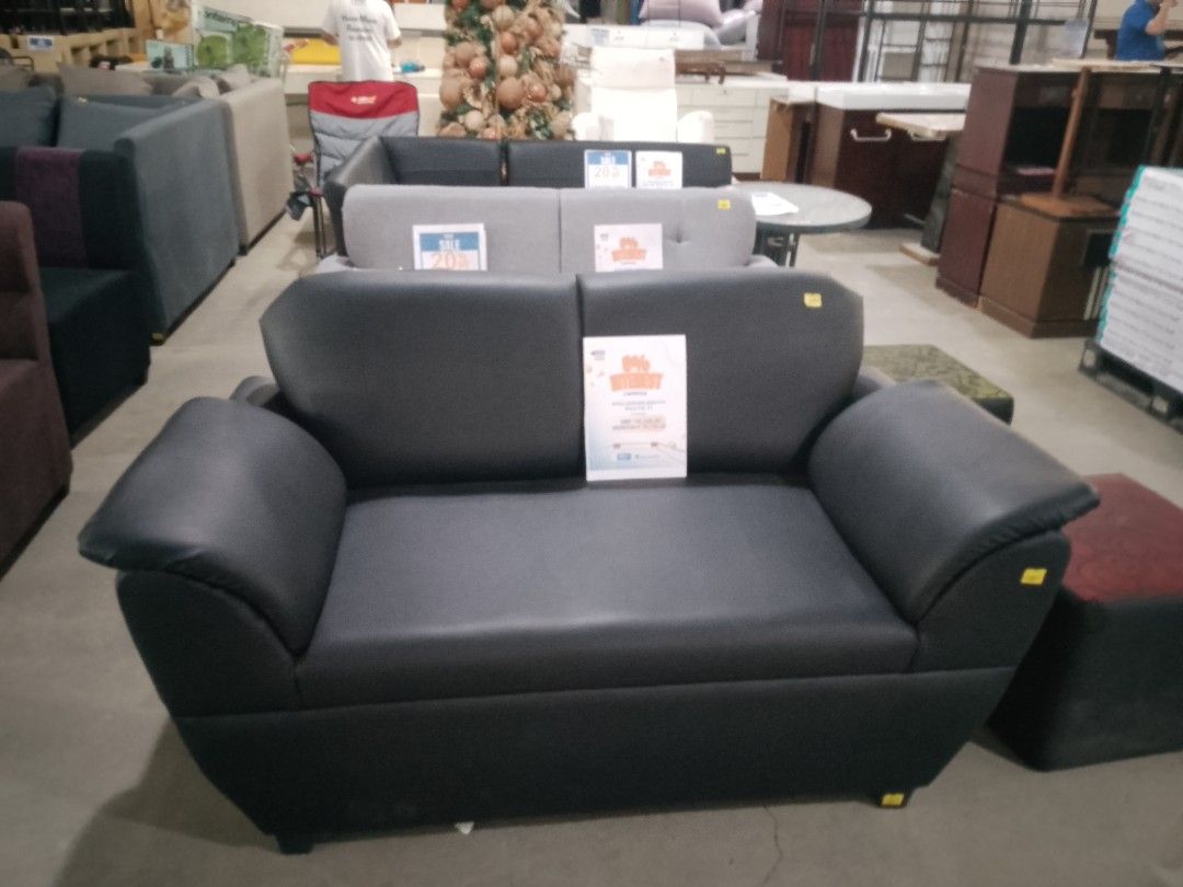 Black Faux Leather Loveseat Sofa (Category: Sofas) located in Manila. Submitted by fiercehorse_40fdc9 (Listing ID 1462920507, Image 1). Description: - Black faux leather loveseat - Comfortable seating for two - Easy-to-clean material - Ideal for small apartments or as an accent piece - No rips or major damage - Yellow price tags will be removed.