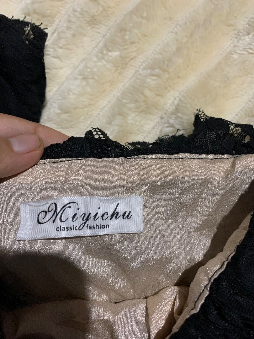 Black Lace Off-Shoulder Ruched Mini Dress (Category: Dresses) located in Caloocan City. Submitted by emmalizz (Listing ID 1463068530, Image 2). Description: - Elegant black lace dress with a nude lining. - Flattering off-shoulder neckline. - All-over ruched detailing for a textured look. - Stylish puff sleeves with a subtle flare. - Adjustable drawstring at the hem for a customizable fit. - Ideal for evening wear or special occasions..