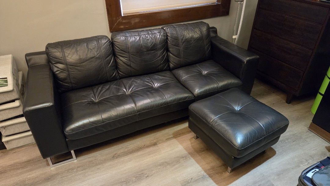 Black Leather 3-Seater Sofa with Ottoman (Category: Sofas) located in Taguig. Submitted by ginoerms (Listing ID 1463010638, Image 1). Description: Genuine Leather Sofa 3 Seater with Ottoman Dimensions in Inches Sofa Depth - 32" Length - 79" Height - 26" Ottoman Depth - 16" Length - 16" Height - 22" Pick up in AFPOVAI, Taguig Negotiable.