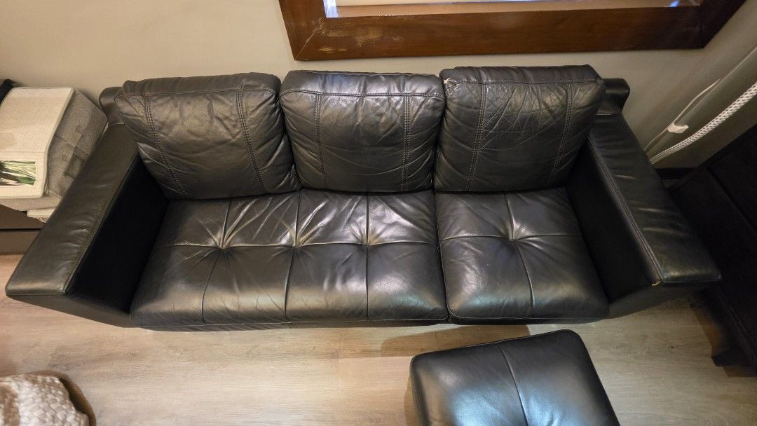 Black Leather 3-Seater Sofa with Ottoman (Category: Sofas) located in Taguig. Submitted by ginoerms (Listing ID 1463010638, Image 3). Description: Genuine Leather Sofa 3 Seater with Ottoman Dimensions in Inches Sofa Depth - 32" Length - 79" Height - 26" Ottoman Depth - 16" Length - 16" Height - 22" Pick up in AFPOVAI, Taguig Negotiable.