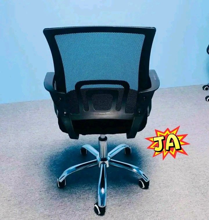 Black Mesh Back Office Chair with Chrome Base (Category: Chairs) located in Manila. Submitted by berdenmarl01688 (Listing ID 1463103063, Image 1). Description: - Comfortable mesh back for breathability - Sturdy chrome base with smooth-rolling wheels - Ideal for extended work or study sessions - Fits most standard desk heights - Available for purchase in sets of four.