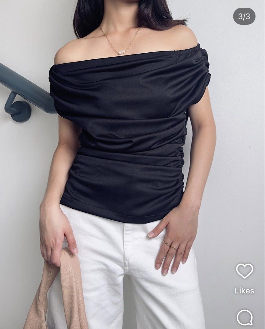 Black Off-Shoulder Ruched Top (Category: Blouses) located in Marikina City. Submitted by m.wardrobeph (Listing ID 1462927459, Image 1). Description: *Photo not mine* Miu the label star top V high quality Retails for 1500 Rfs: too big on me - Stylish black off-shoulder top - Features flattering ruched detailing - Made with comfortable, stretchy fabric - Effortlessly dress up or down - Perfect pairing with jeans or skirts.