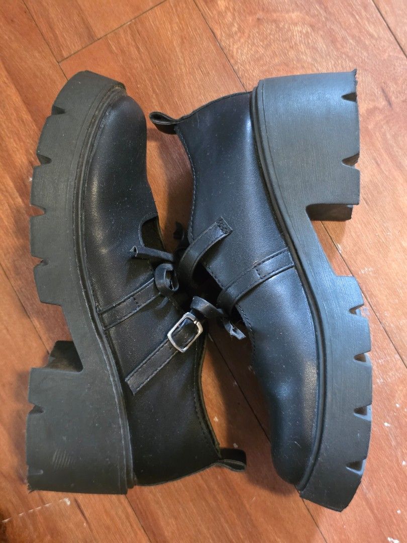 Black Platform Mary Jane Shoes with Buckle Strap (Category: Loafers) located in Quezon City. Submitted by dix888 (Listing ID 1462909230, Image 2). Description: - Black Mary Jane shoes - Chunky platform sole with deep tread for grip - Strap with buckle closure - Small bow detail - Size 38 - Perfect for gothic or punk fashion.