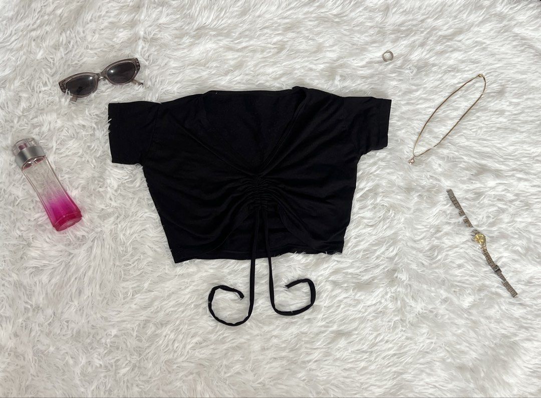 Black Ruched Drawstring Crop Top (Category: Others Tops) located in Tuguegarao City. Submitted by love_clothies (Listing ID 1462901727, Image 1). Description: - Cute black crop top - V-neckline - Short sleeves - Adjustable front drawstring detail - Super comfy fabric - Easy to style with jeans or skirts - Perfect for casual outings or a night out.