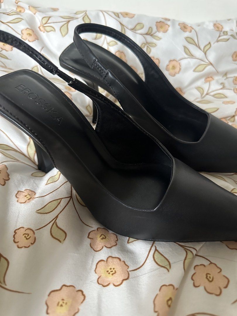 Black Slingback Heels Size 35 (Category: Heels) located in Lipa City. Submitted by chiechums (Listing ID 1462949403, Image 1). Description: - Type: Black Slingback Heels - Size: 35 - Design: Pointed toe - Fit: Elastic strap at the back for a secure fit - Heel: Unique sculpted shape - Style: Perfect for dressing up or down.