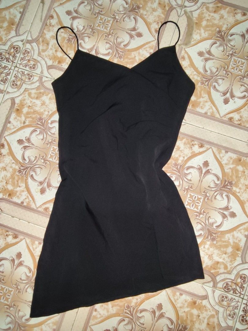 Black Spaghetti Strap Mini Dress (Category: Dresses) located in Manila. Submitted by chocobutternut_ (Listing ID 1463072359, Image 1). Description: - Black mini dress - Spaghetti straps - V-neckline - Asymmetrical hemline - Back zipper closure - Simple, chic, and versatile.